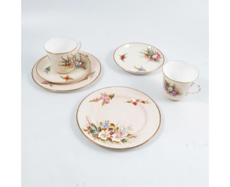 En-suite to the above, two Royal Worcester tea cups, saucers and side plates (the side plates unmarked), decorated with field