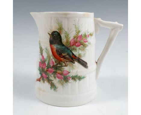 A Royal Worcester rustic wicker moulded jug, decorated with a bullfinch, height 3.25insCondition Report:  Minor staining