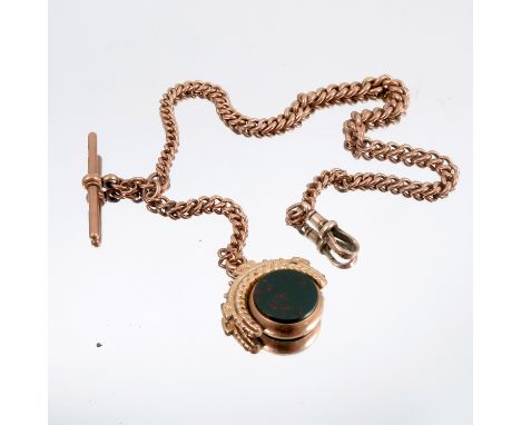 A 9 carat gold watch chain, of graduated solid curb links, with a swivel seal attached, 35.5cm long, 33g gross