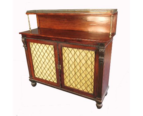 A 19th century rosewood chiffonier, the supastructure over with a brass column and gallery supporting a shelf, having two bra