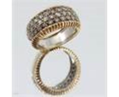 A two colour 18 carat gold diamond ring, the frontispiece pave set with forty three diamonds, totalling approximately 1.07 ca