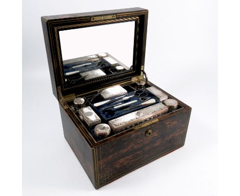 A Victorian Lund of London coromandel wood travelling vanity case, the box with brass inlay, the interior fitted with a mirro