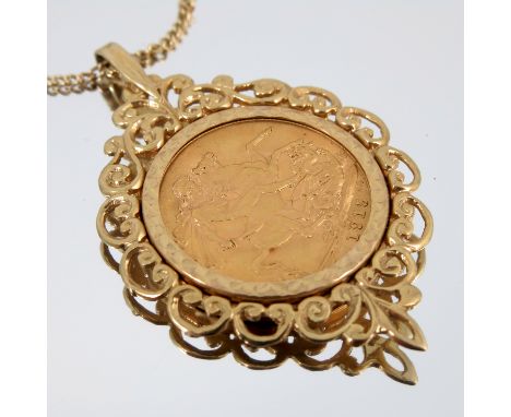 A 1915 Sovereign, in a 9 carat gold pendant, on a chain stamped '9ct' to the bolt ring, 16.5g gross