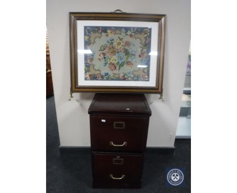A two drawer filing chest and a tapestry fire screen 