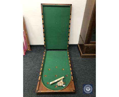 A Victorian mahogany folding table top Bagatelle table and accessories 