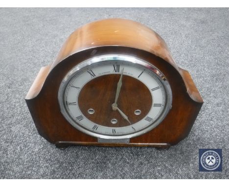 A walnut cased Smiths mantel clock with pendulum and key 