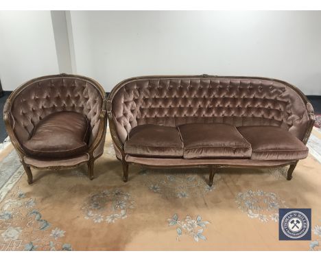 A French walnut framed salon settee and armchair in pink button dralon   