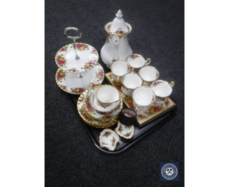 A tray of twenty two piece Royal Albert Old Country Roses tea service, four further dishes (two boxed) and a thimble 