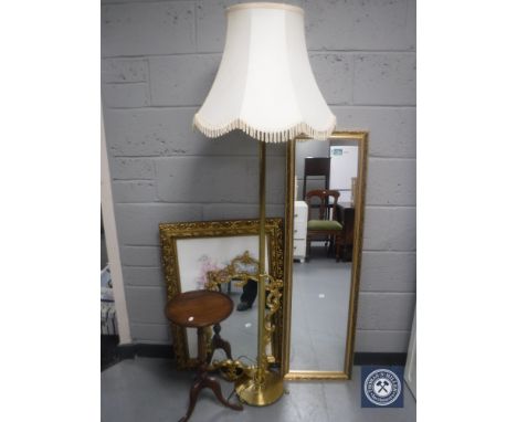 A brass column standard lamp and shade, pedestal wine table, gilt framed print, gilt hall mirror and an ornate framed mirror 