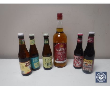 A bottle of Queen Margot blended Scotch whisky, 1 litre, and five bottles of beer 