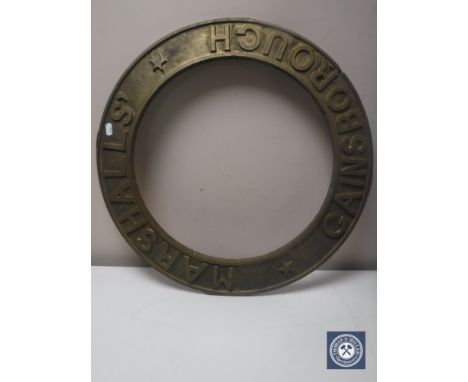 A circular brass engine plaque "Marshalls of Gainsborough" 
