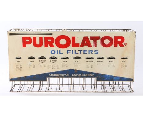 Purolator Oil Filters rack, the white enamel sign with with Purolator in red above black image of cars and models to include 