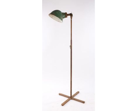 Industrial lamp, the green enamel shade above the adjustable pole
