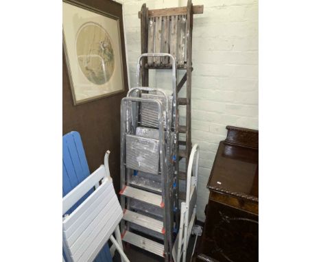 Three sets of aluminium step ladders, wooden step ladder and folding sack barrow step ladder combo.