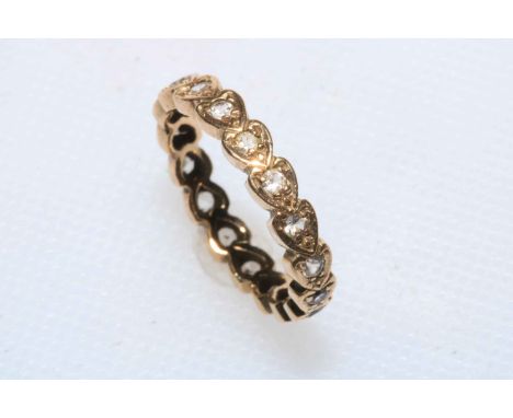 9 carat gold white stone eternity ring, size K.