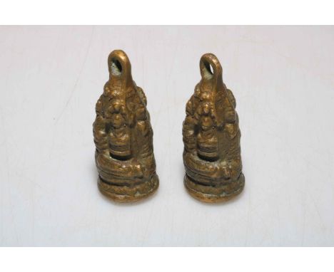 Two Chinese bronze opium weights.