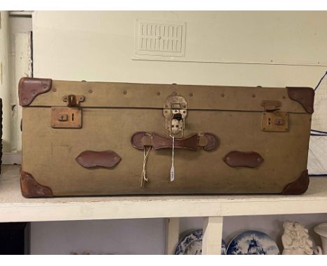 Vintage canvas and leather bound travelling trunk.