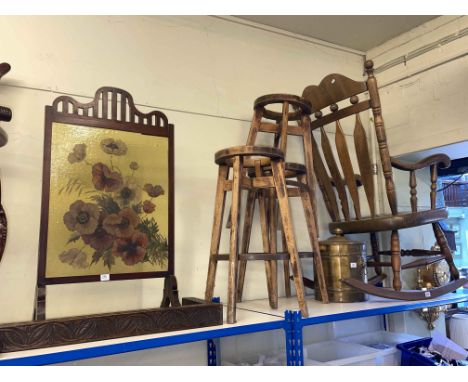 Farmhouse style rocking chair, three circular bar stool frames, mahogany and painted glass firescreen, oak kerb and brass coa