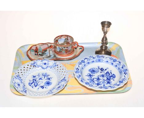 Two Meissen Pottery blue and white plates, Japanese cup and saucer, and silver candlestick.
