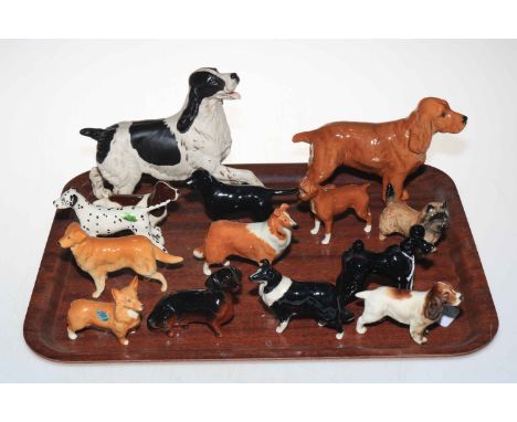 Fourteen various Beswick dogs including Dachshund, Poodle, Setters, Corgi, etc.