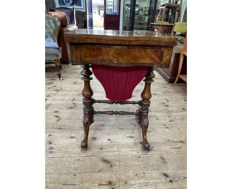 Victorian figured walnut games table with swivel folding top revealing chess, backgammon and dominoes board above frieze draw