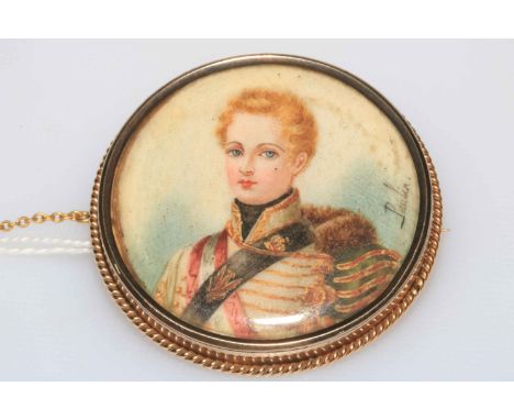 Signed Paulin portrait miniature of young military figure, 14k gold brooch mount with rope twist border, 4.5cm diameter.