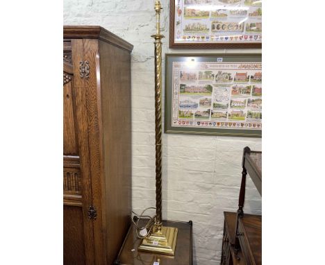 Brass twist column standard lamp and four various Chinese rugs.
