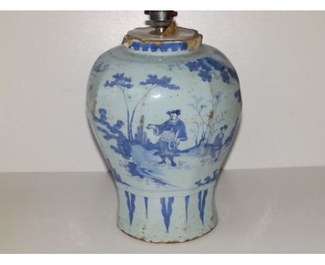 An 18thC delft blue &amp; white vase, of octagonal inverted baluster shape, painted with chinoiserie figures,  10.5" high - t