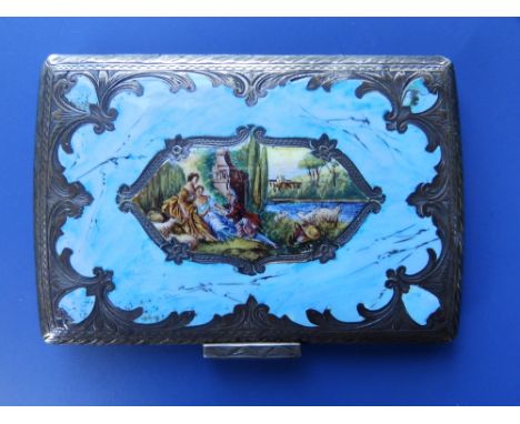 An enamelled silver rectangular compact case, the hinged cover decorated to centre with an 18thC style pastoral scene against