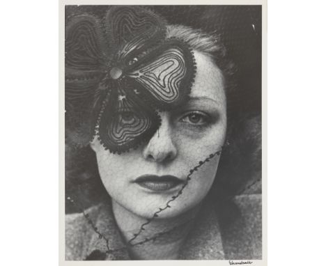 Alfred Eisenstaedt,American/German 1898-1995,Model with veil by hat designer Lily Daché, NYC, 1937;black and white photograph