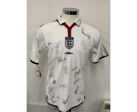 England Euro 2004 Multi Signed Football Shirt: White home shirt in size large brand new with tags. Given to major sponsor who