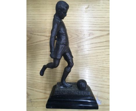 Stanley Matthews Bronze Football Statue: Heavy bronze statue measuring nearly 10 inches high with the name Stanley Mathews to