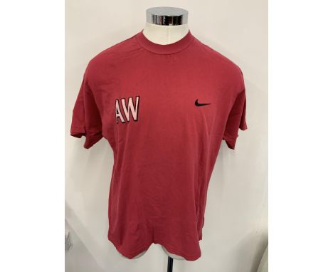 Arsene Wenger Arsenal Training Kit: The managers red shorts and short sleeve matching top. C/W beige heavy long sleeve sweat 