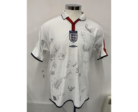 England Euro 2004 Multi Signed Football Shirt: White home shirt in size large brand new with tags. Given to major sponsor who