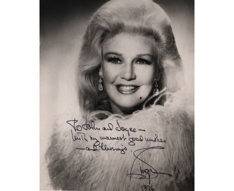 GINGER ROGERS. An 8x10" black and white photographic print signed in black ink by Ginger Rodgers with inscription, dated 1976