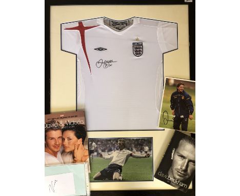 DAVID BECKHAM SIGNED ITEMS. Four signed items to include: a mounted and framed England football shirt signed in marker pen by