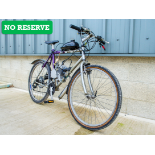 Adults mountain bike with petrol engine conversion