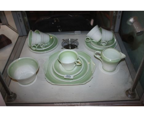A delicate Shelley green banded pattern 12869 1930's part Teaset including five cups, six saucers, six tea plates, milk jug, 