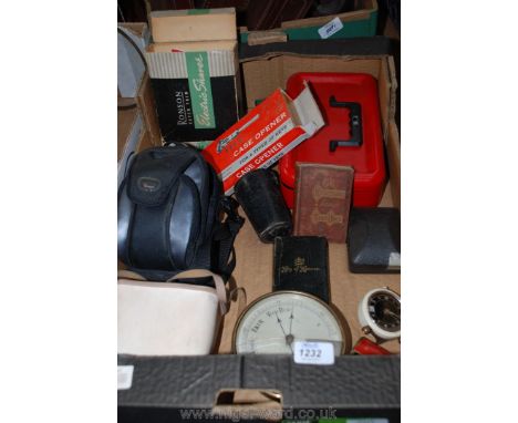 A box of miscellaneous including a red cash box, a cased Pentax camera, a cased Kodak Brownie Flash II Camera, a Ronson elect