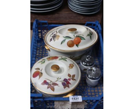 Two Royal Worcester 'Evesham' dishes and two egg coddlers
