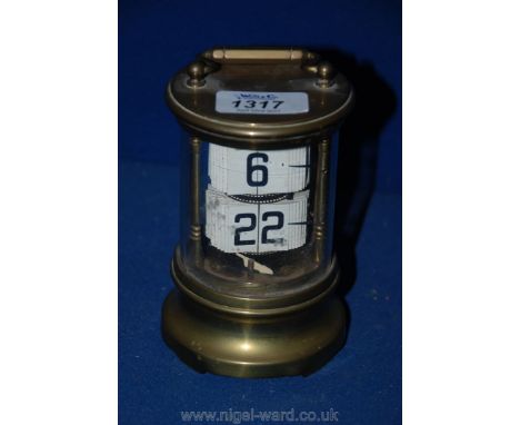 An unusual Brass carriage style Clock with flip-page numerals