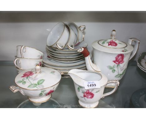 A Sango Japanese 'Monterey' pattern Teaset including teapot, sugar bowl with lid (chip to rim), milk jug, six cups and saucer