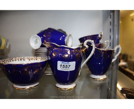 A pretty cobalt blue Royal Standard vintage bone china part Teaset including cake plate, six saucers, seven cups, six tea pla