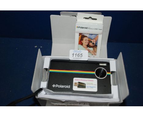 A Polaroid Z2300 Instant Print and film, boxed and complete