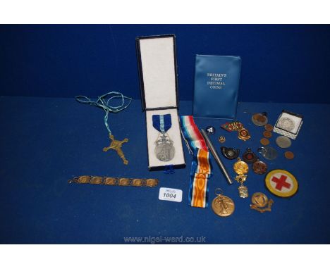 A cased set of decimal Coins, enamel badges and medals, etc.