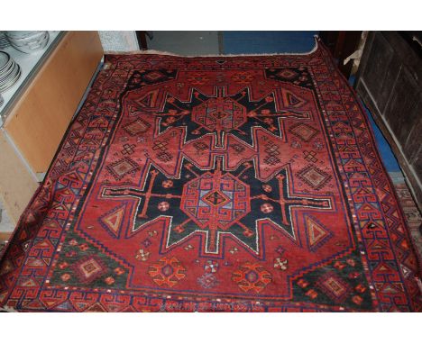 An Afghan Persian type Wool Carpet 6' 9" x 5' 10" approx