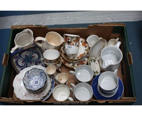 A box of china including part 'Park Place' china Teaset, double egg cup, Minton coffee mug, Purbeck Ceramic Swanage Jug, etc.