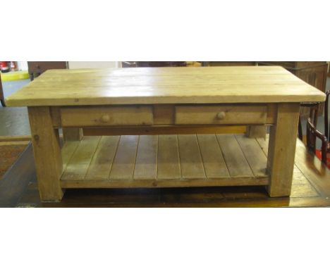 Heavy natural pine rectangular coffee table with frieze drawers and under shelf on square legs. (B.P. 24% incl. VAT)