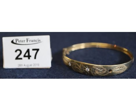 9ct gold engraved bangle, weight 6.7g approx.(B.P. 24% incl. VAT)