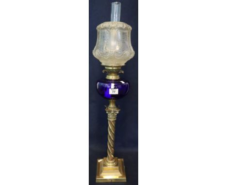 Large brass double burner oil lamp with blue glass reservoir and brass Corinthian column pedestal on square stepped base, fro